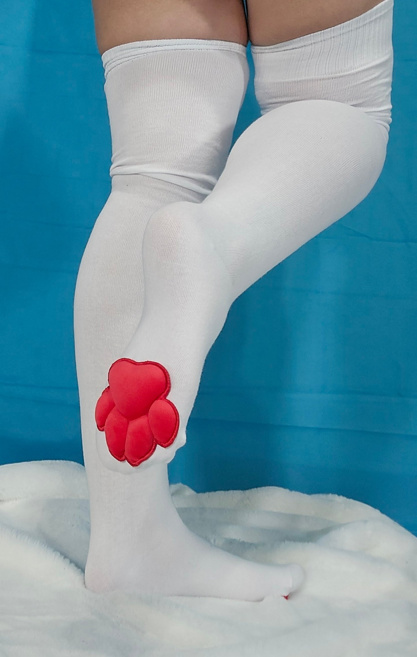 Red Mochi Stuffed Cat Paw Pad on White Thigh High Socks for Cosplay
