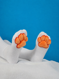 Plush Orange Mochi Paw Pads on White Thigh High Socks