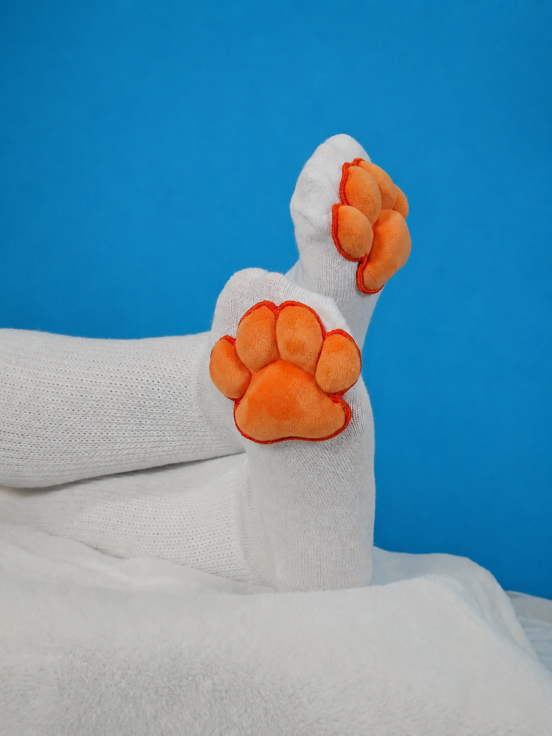 Plush Orange Mochi Paw Pads on White Thigh High Socks