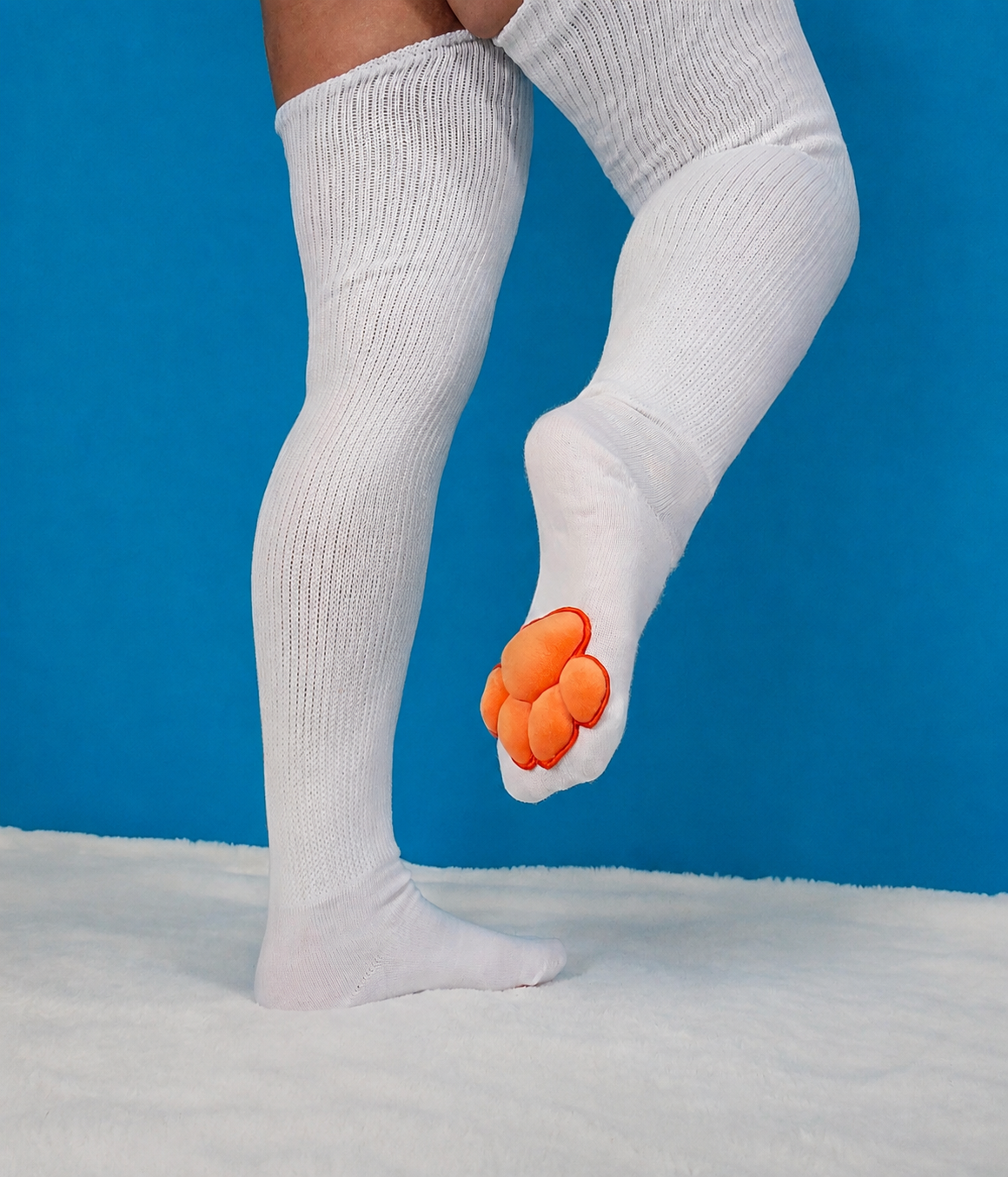 Plush Orange Mochi Paw Pads on White Thigh High Socks
