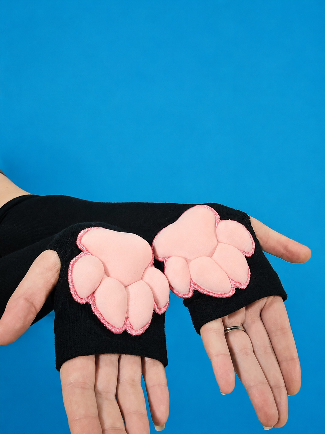 Pink Plush Paw Pads on Black Gloves